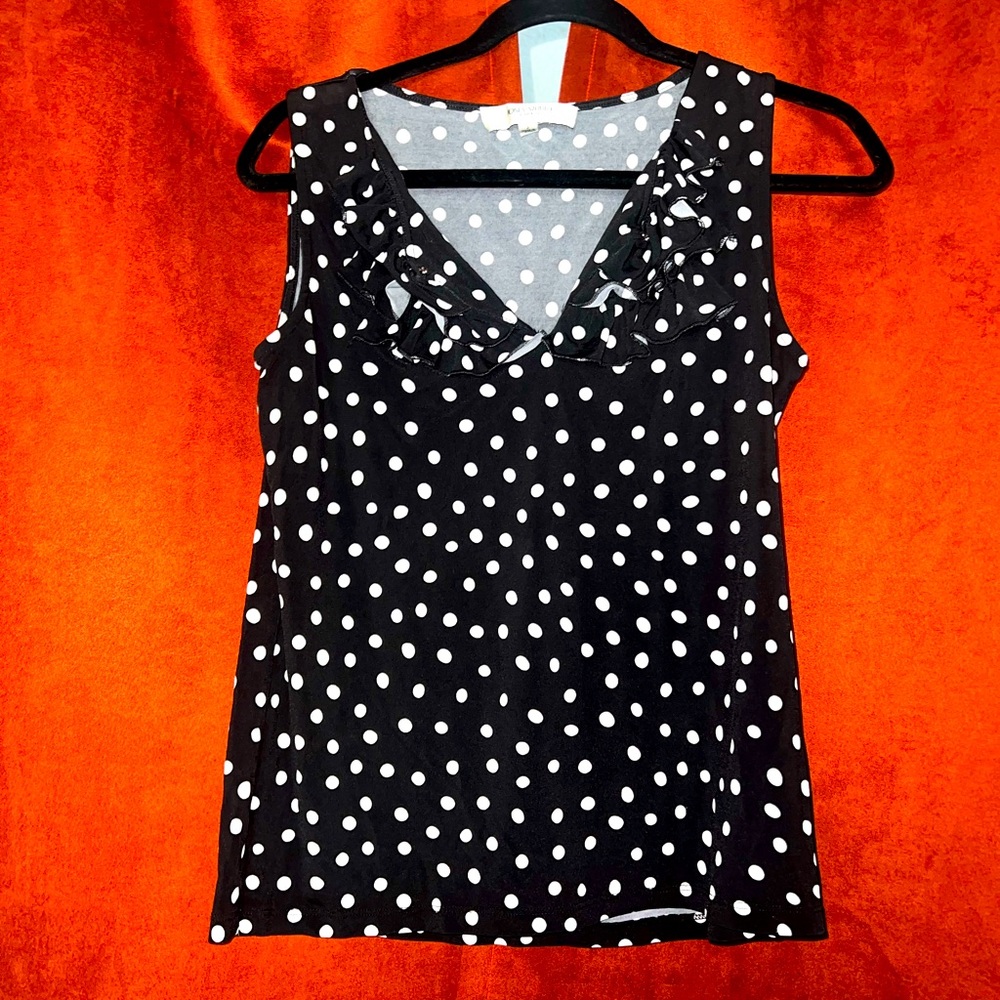 Polka dot top. Plunging neckline